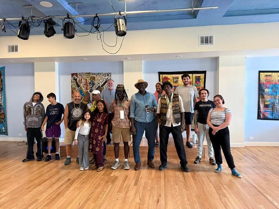 Artists and guests in the gallery